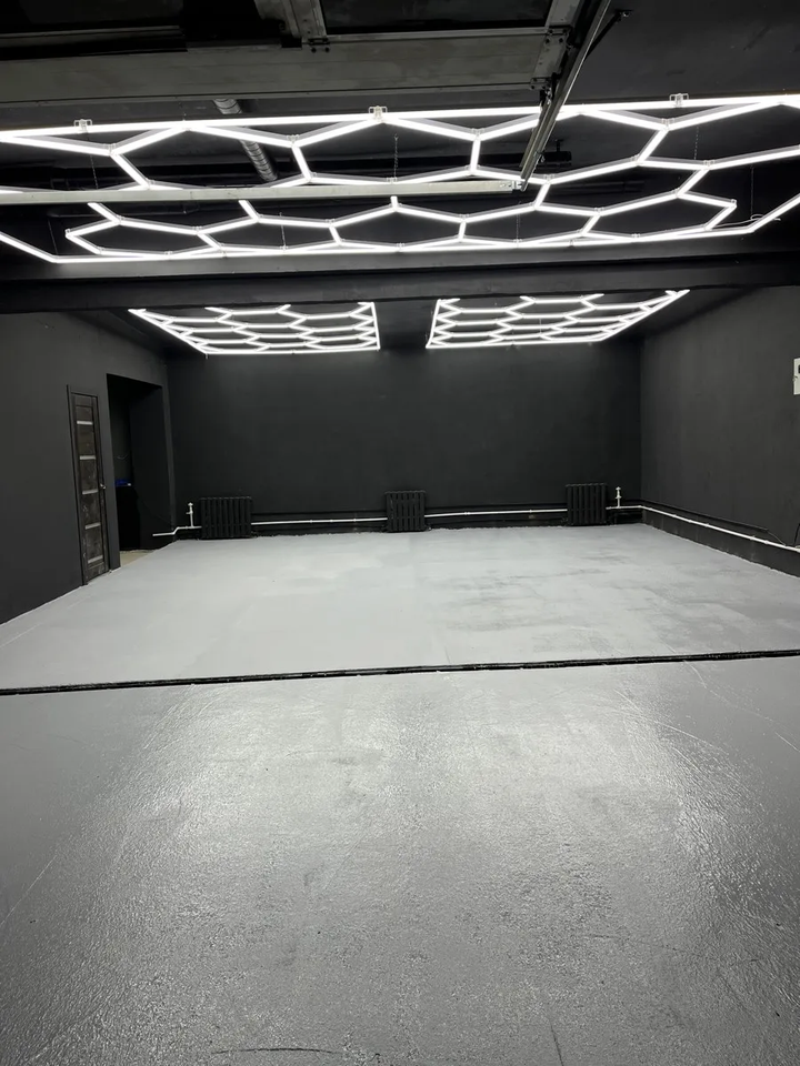 3 hexagonal lighting system in studio black wall