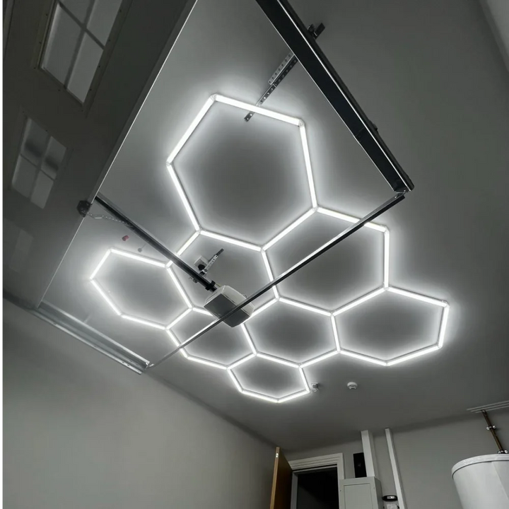 8 hexagon lighting system on white ceiling 